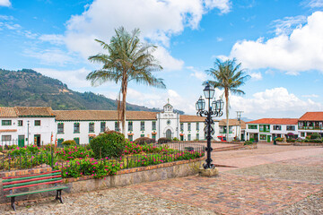 Historic Square in Mongui, Boyaca, Colombia with Andean Background