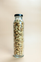 Tasty cashew nuts in tall glass. Healthy eating.