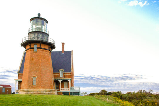 Block Island, RI - USA: South Light at sunset showing tower in front of lightkeeper house