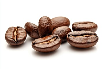 Obraz premium A collection of roasted coffee beans on a white background.