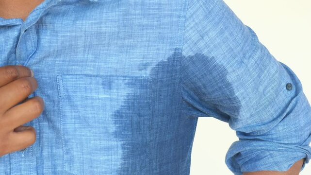 man with wet armpits Smelly odor from sweat .