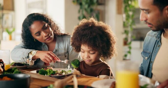Broccoli, eating or refuse with parents and child in dining room of home together for meal or supper. Annoyed, frustration or stubborn with family in apartment for healthy food and vegetables