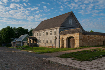 View of historical merchant buildings of estates on the main street of Izborsk Pechorskaya Street...
