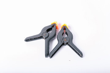 black orange plastic clamp (screen clamp) Isolated on white background.