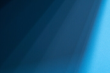 Studio style background wall decoration presentation uses white and blue tones. with shadows cast from a nearby window, concept creating a decorative backdrop.