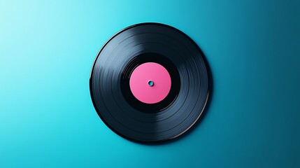 Obraz premium Black vinyl record with pink label on a blue background.