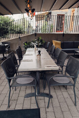 Outdoor Dining Table and Chair Set on a Terrace
