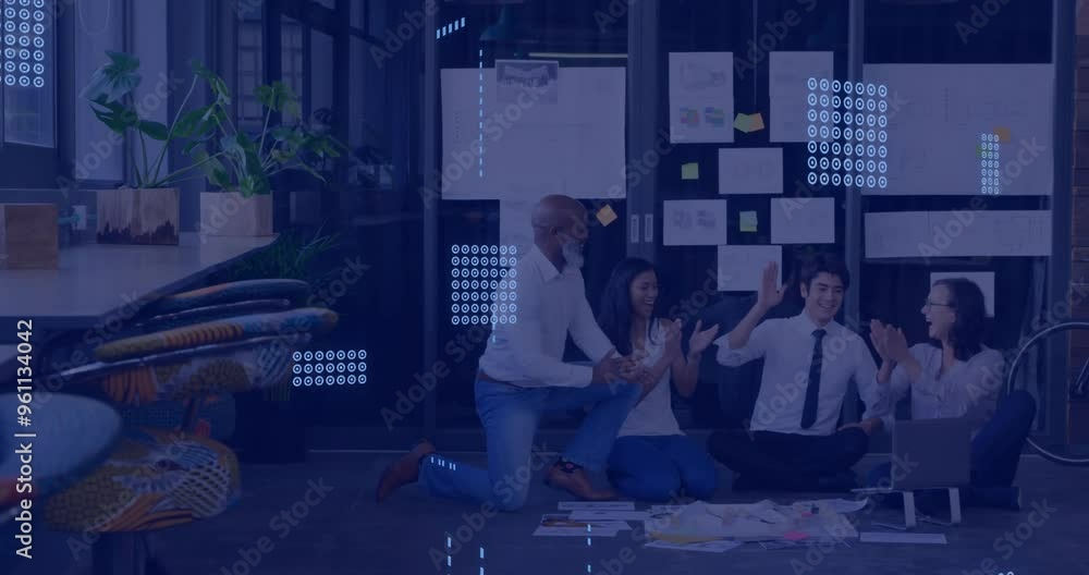 Aufkleber data processing animation over diverse team collaborating on floor in modern office