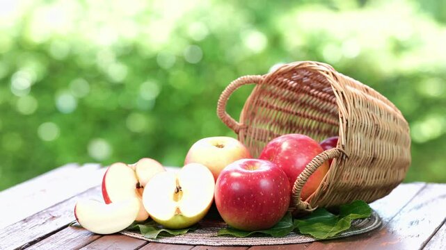 Red Japanese Apple on bamboo basket Shinano Red and Sansa  Apple on wooden background. d. 