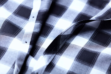 Close up of Men's checkered shirt.	