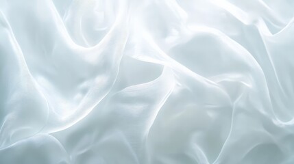 Obraz premium Soft folds of white silk fabric creating a smooth and elegant texture, perfect for backgrounds, textiles, and luxury design elements.