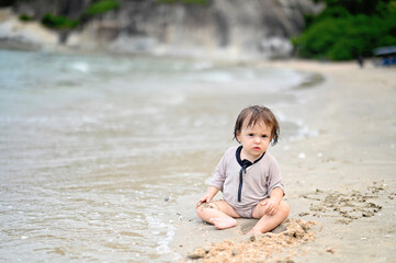 Baby girl on the beach