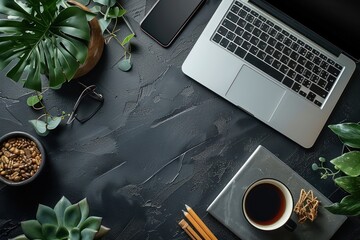 Designer's Essential Workspace: Black Desk with Laptop, Smartphone, Coffee, and Work Supplies - Top View