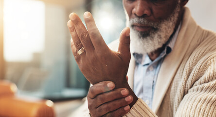 Home, hands and senior black man with wrist pain for injury, inflammation and discomfort of carpal...