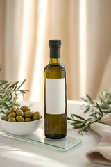 Elegant Olive Oil Bottle with Blank Label Beside Bowl of Olives