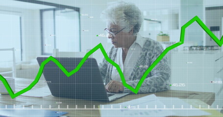 Image of financial data processing over senior african american woman using laptop
