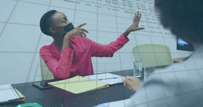 Image of financial data processing over african american woman in face mask