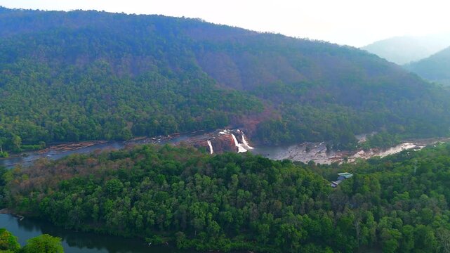 athirapally waterfalls. drone slowly moving forward The camera focus on the waterfall