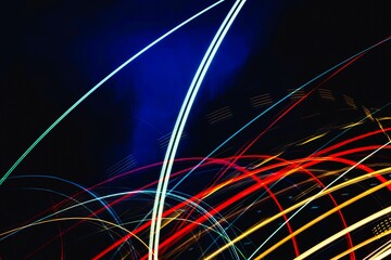 The image is a colorful, abstract representation of light and movement. The various colors and...