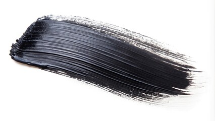 Abstract image of a black brush stroke on a white background with depth of field