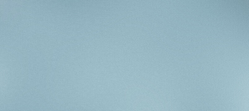 Grainy light blue texture background providing copy space