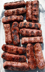 Cevapcici, specialty of the Balkan countries, roasted kebabs on the grill