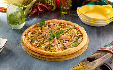 Smoked Salmon and Pesto Pizza with Fresh Basil and Traditional Italian Ingredients