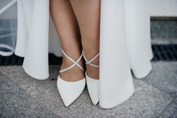 White leather women's shoes with rhinestones