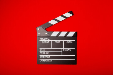 Movie clapper. Movie clapperboard on a bright colored background. Concept of rest and...