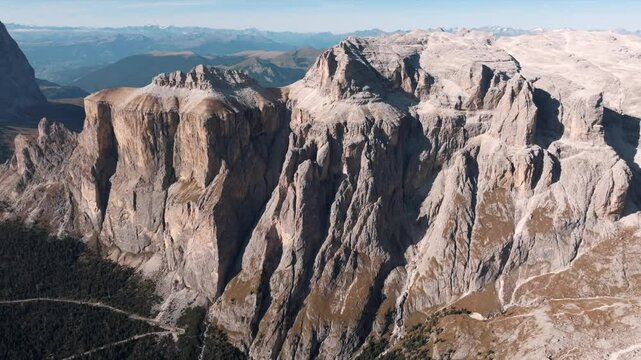 Aerial view of mountain peaks during sunrise in the Dolomites, Italy