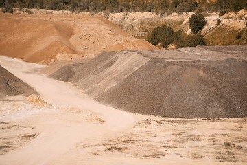 Bright midday sun illuminating quarry
