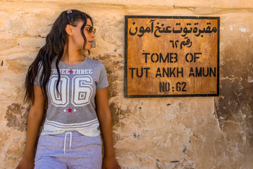 Tourists Unearthing the mysteries of ancient Egypt in Tutankhamun's tomb. Exploring the hidden...