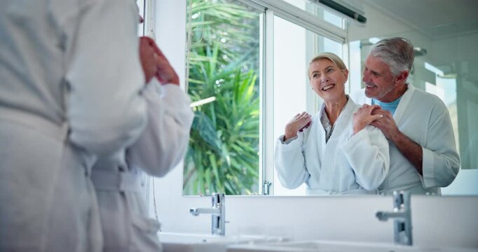 Hug, senior couple and morning in hotel bathroom with mirror, commitment and trust together from marriage. Relax, calm and people on anniversary with love, support and romance with weekend away