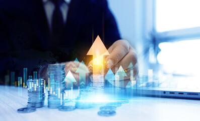Saving money concept.Stack of coins with trading price graph growth.Money business financial graph...