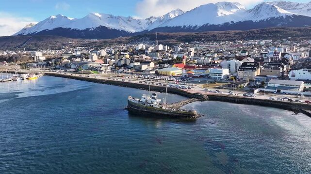Saint Christopher Boat At Ushuaia In Tierra Del Fuego Argentina. Saint Christopher Boat. Ship Sculpture. Downtown Cityscape. Saint Christopher Boat At Ushuaia In Tierra Del Fuego Argentina.