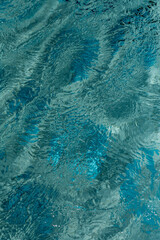 the wind and waves made the water in the pool look frozen