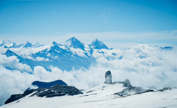 Snowy peaks and clouds in the Diablerettes, Swiss Alps at Glacier 3000