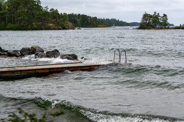 Bathing jetty in windy weather Vastanvik Motala Sweden