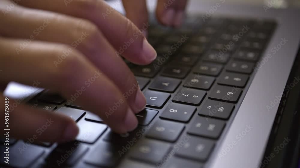 Poster female professional working from home, typing quickly on her laptop, focused on the screen while han