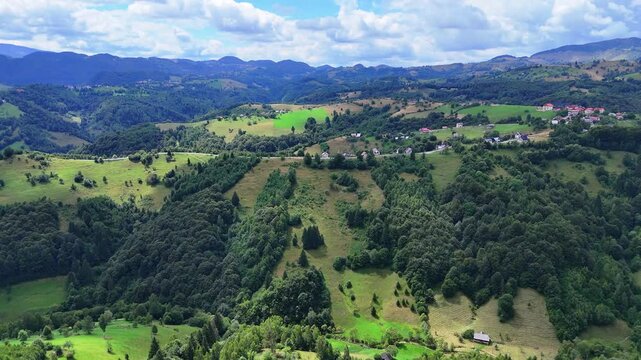 Aerial view of a road at high altitude leading to Pestera village in the Carpathian mountains