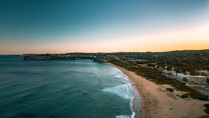 A breathtaking aerial view of Mona Vale Beach in the Northern Beaches of NSW, Sydney, Australia, captured in stunning 4K resolution. 