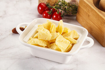 Crushed parmesan cheese in the bowl