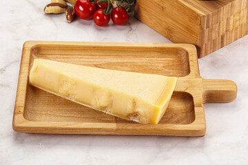 Hard parmesan cheese piece triangle