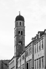 Church and bell tower of the Franciscan friary situated at the Stradun, the main street of Old town Dubrovnik in Croatia