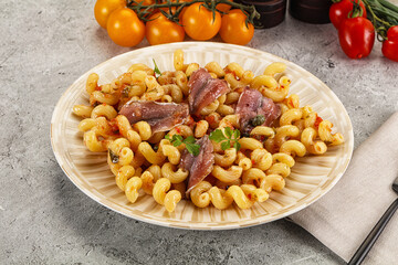 Italian pasta cellentani with anchovy
