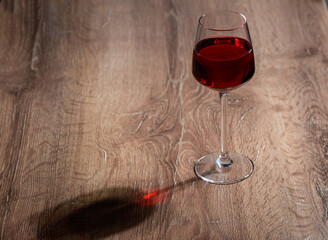 Glass of red wine on bar