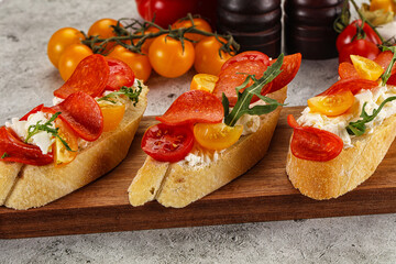 Bruschetta tapas with chorizo and tomato