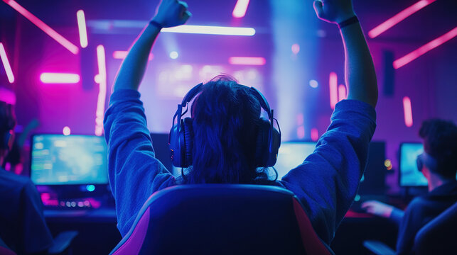 E-sports competition, players focus on the screen, neon lights illuminate the game arena, enthusiastic audience cheers for them