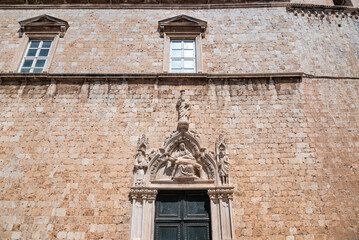 Church and bell tower of the Franciscan friary situated at the Stradun, the main street of Old town Dubrovnik in Croatia