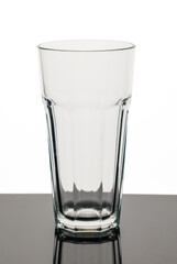 Empty Glass isolated on a white background with reflection